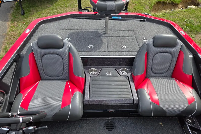 Slide: The Image of 2020 Ranger Z520C Cup-Equipped boat interior with red and gray seating. - 10
