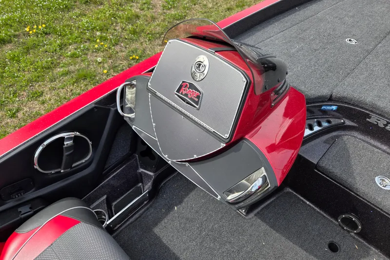 Slide: The Image of 2020 Ranger Z520C Cup-Equipped boat interior with red and black dashboard. - 11
