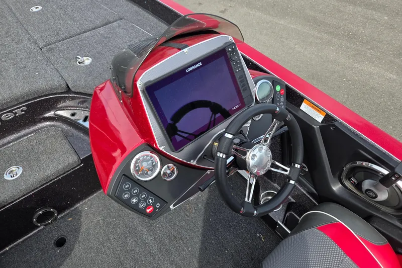 Slide: The Image of 2020 Ranger Z520C Cup-Equipped boat dashboard with steering wheel and navigation display. - 8