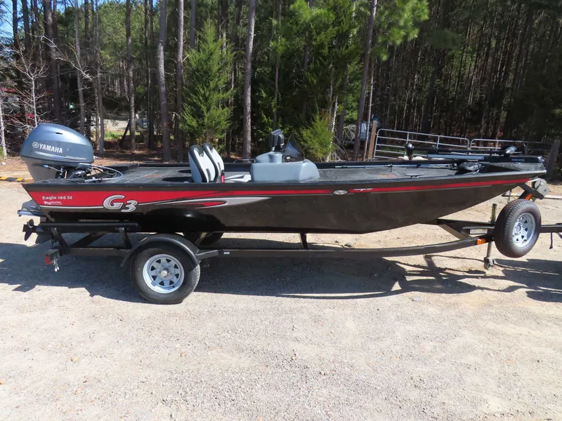 Slide: The Image of 2012 G3 Eagle 166 SE boat with Yamaha 40 motor on trailer. - 2