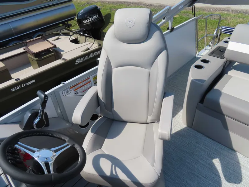 Slide: The Image of Interior of 2026 Premier SUNSATION 210 RL with steering wheel and seat. - 11