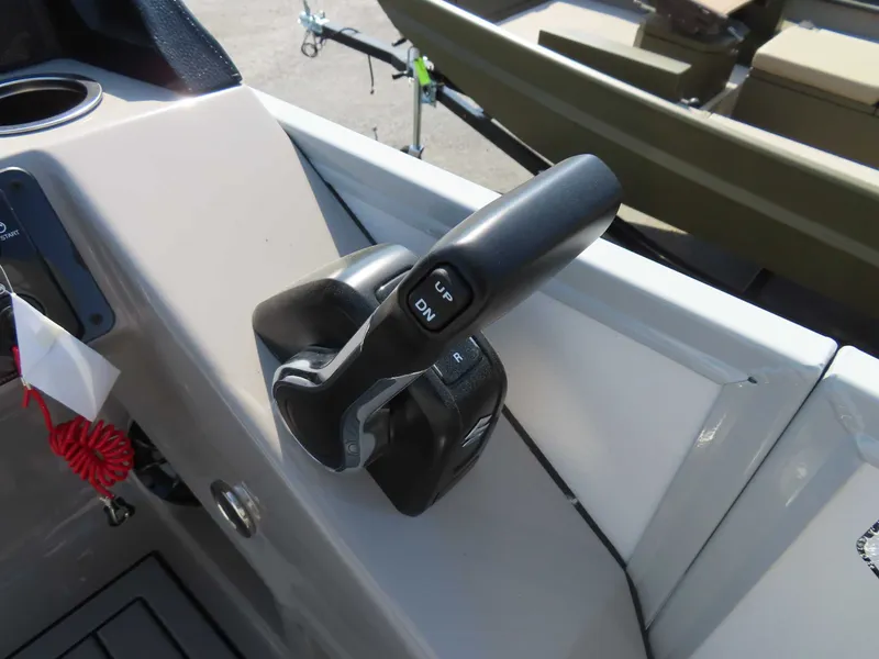 Slide: The Image of Premier SUNSATION 210 RL 2026 boat control with throttle lever. - 14