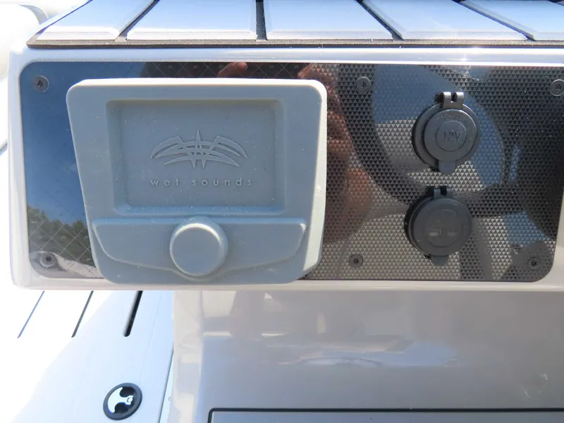 Slide: The Image of Premier SUNSATION 210 RL 2026 with Wet Sounds speaker and 12V outlets. - 18