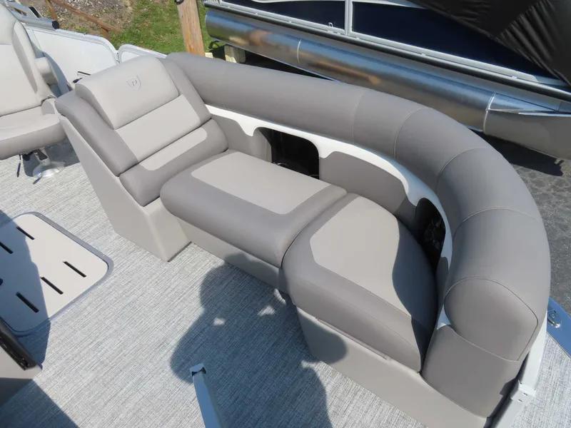 Slide: The Image of Interior of 2026 Premier SUNSATION 210 RL with gray upholstered seating. - 7