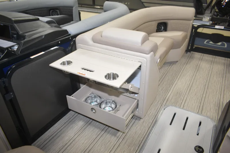 Slide: The Image of Premier 230 SOLARIS RL - PTX CL 2026 boat interior with seating and storage. - 11