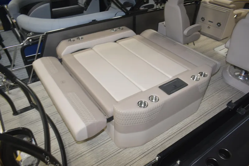 Slide: The Image of 2026 Premier 230 Solaris RL - PTX CL boat interior with luxurious seating and cup holders. - 16