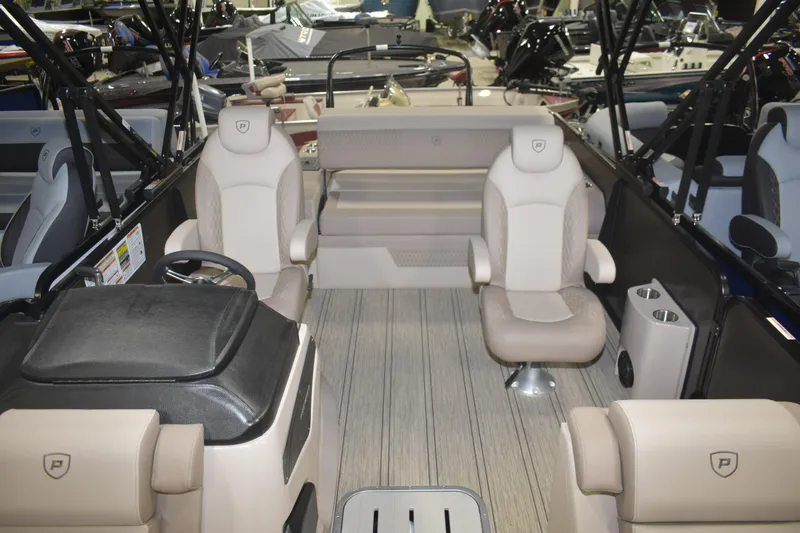 Slide: The Image of Interior of 2026 Premier 230 Solaris RL boat, featuring luxurious seating and modern design. - 6