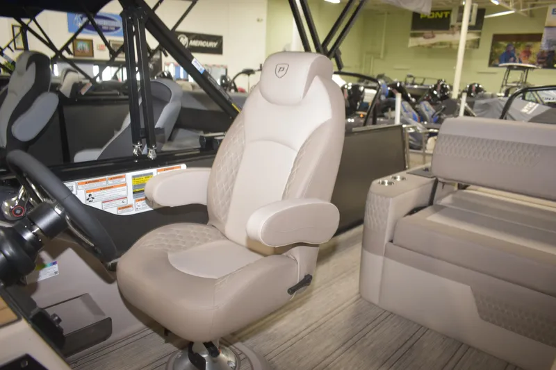 Slide: The Image of Captain's chair and seating in 2026 Premier 230 Solaris RL pontoon boat. - 7