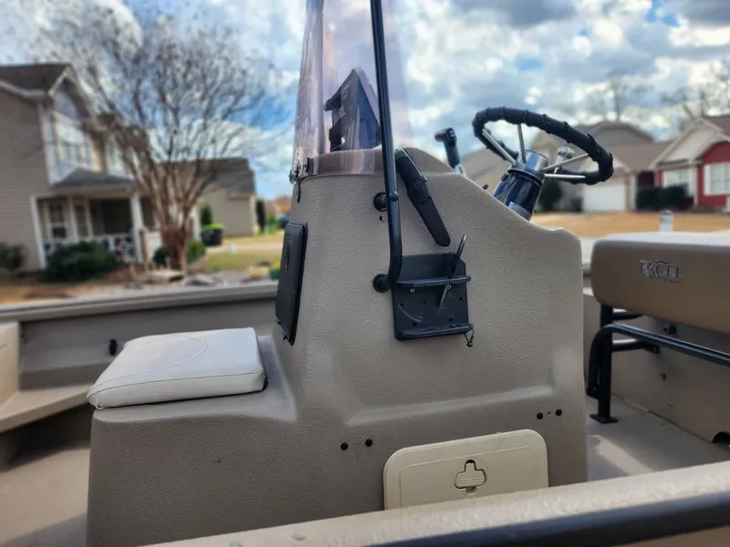 Slide: The Image of Interior view of a 2021 Excel Stealth boat with steering console. - 2