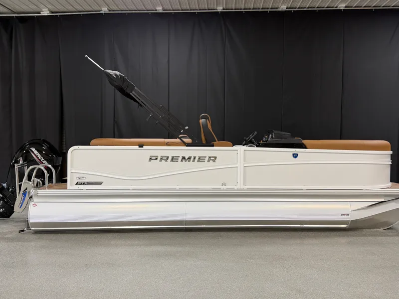 Slide: The Image of A 2027 Premier 210 Sunsation pontoon boat with a white hull and brown seating. - 1