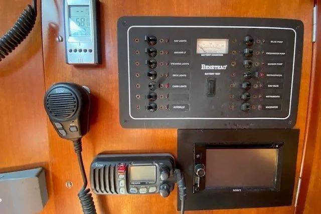 Slide: The Image of Control panel of a 2005 Beneteau Oceanis 373 sailboat with communication devices. - 17