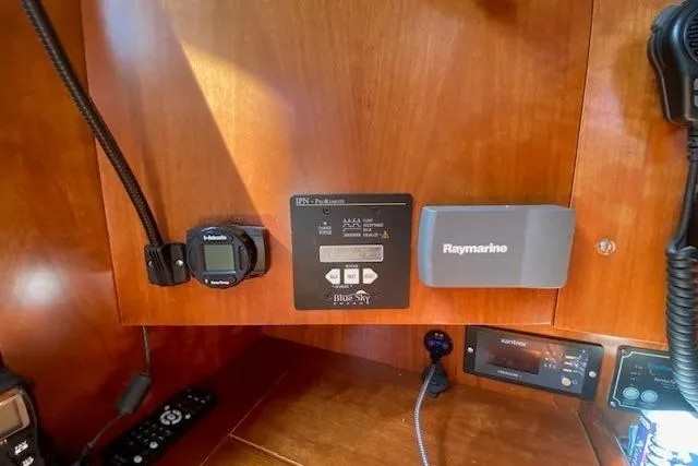 Slide: The Image of Control panel of a 2005 Beneteau Oceanis 373 sailboat with navigation equipment. - 19