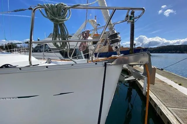 Slide: The Image of 2005 Beneteau Oceanis 373 sailboat docked at marina under clear blue sky. - 3