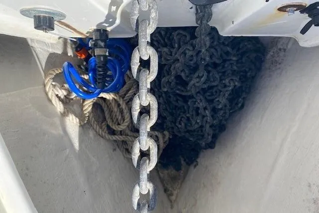 Slide: The Image of Anchor chain and ropes in a 2005 Beneteau Oceanis 373 sailboat locker. - 34