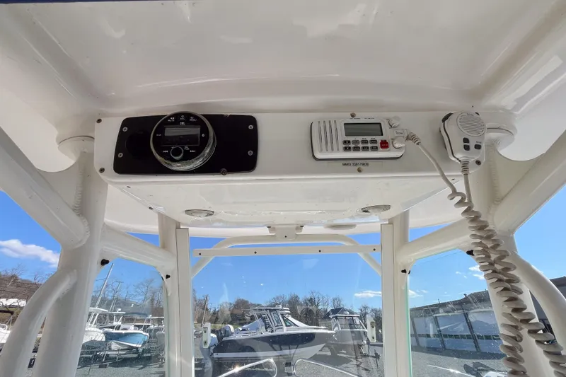 Slide: The Image of Interior view of 2013 Everglades 230 Center Console boat with radio equipment. - 6