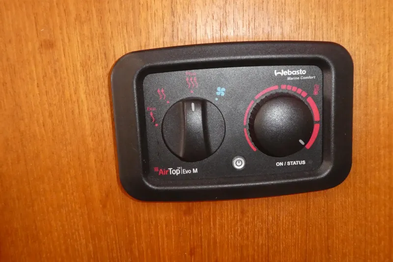 Slide: The Image of Webasto Air Top Evo M control panel on 2015 Ranger Tugs R-25 SC boat. - 13