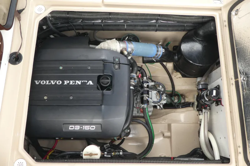 Slide: The Image of Engine compartment of 2015 Ranger Tugs R-25 SC with Volvo Penta D3-150 engine. - 19