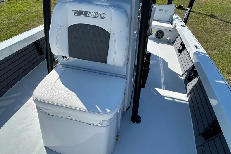 Slide: The Image of 2026 Pathfinder 2500 Hybrid boat interior with cushioned seating and sleek design. - 10