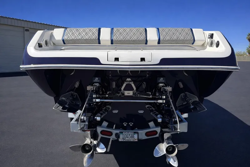 Slide: The Image of Rear view of a 2008 Sleekcraft 34' Heritage boat with dual propellers. - 13