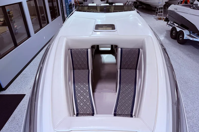 Slide: The Image of 2008 Sleekcraft 34' Heritage boat interior with quilted seating in showroom. - 16