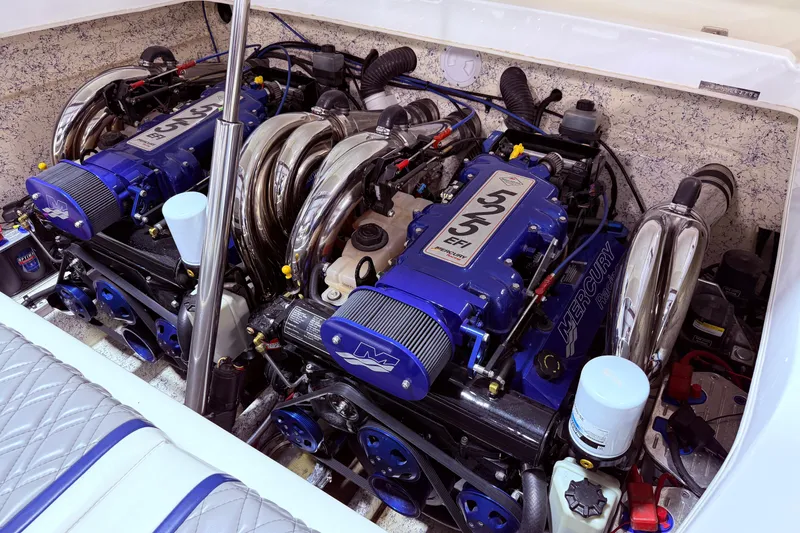 Slide: The Image of Twin Mercury Racing engines in a 2008 Sleekcraft 34' Heritage boat engine compartment. - 24
