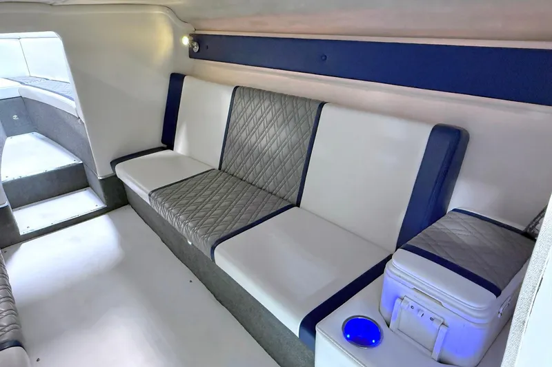 Slide: The Image of Interior of 2008 Sleekcraft 34' Heritage boat with modern seating and ambient lighting. - 26