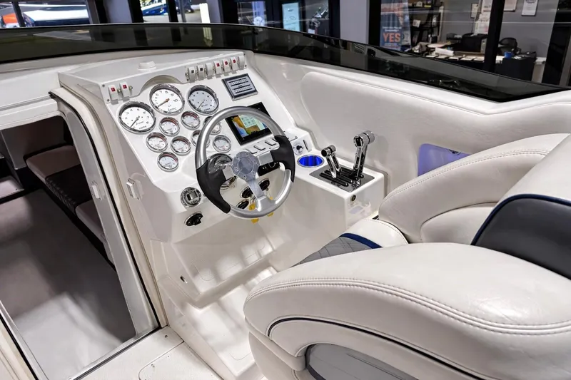 Slide: The Image of Cockpit of 2008 Sleekcraft 34' Heritage boat with modern controls and gauges. - 27
