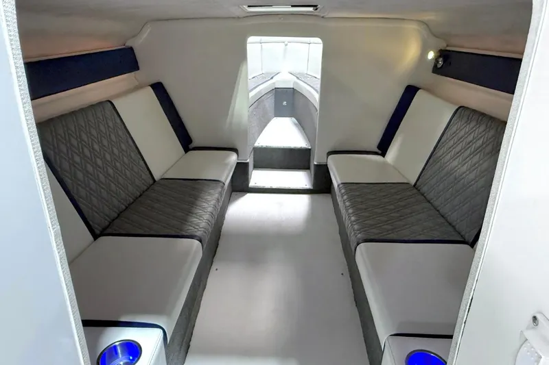 Slide: The Image of Interior of 2008 Sleekcraft 34' Heritage boat with modern seating and ambient lighting. - 28