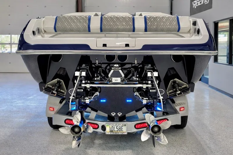 Slide: The Image of Rear view of a 2008 Sleekcraft 34' Heritage boat with dual propellers. - 35