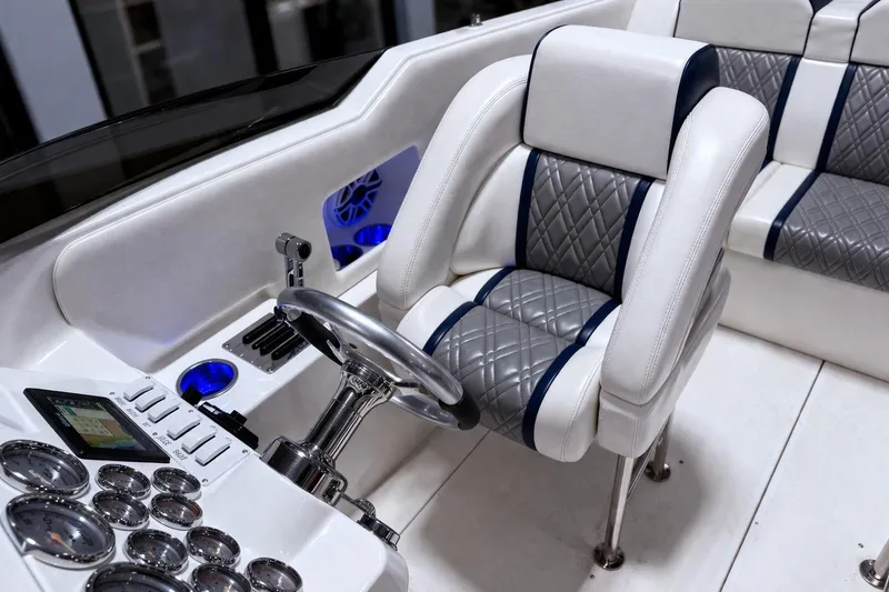 Slide: The Image of Luxurious interior of 2008 Sleekcraft 34' Heritage boat with modern dashboard and seating. - 5