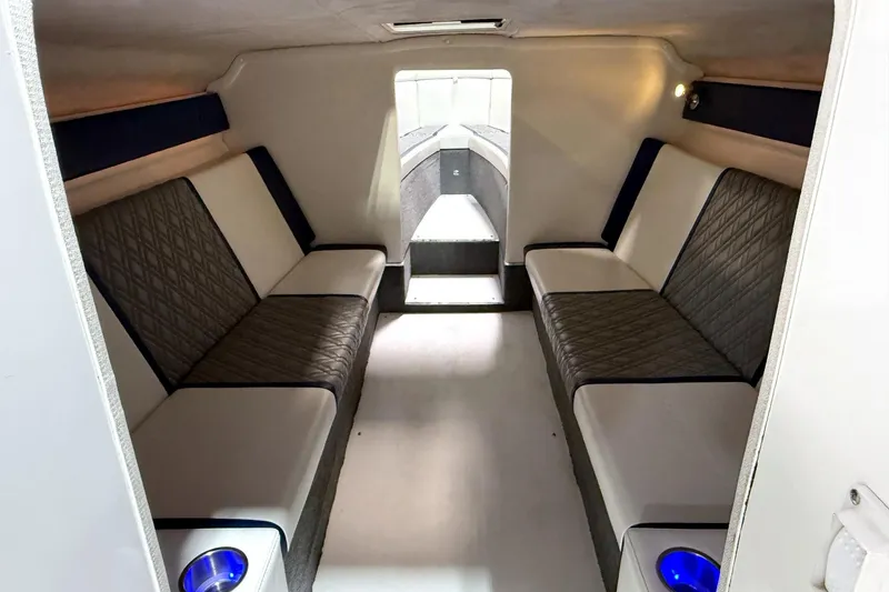 Slide: The Image of Interior of 2008 Sleekcraft 34' Heritage boat with cushioned seating and modern design. - 9
