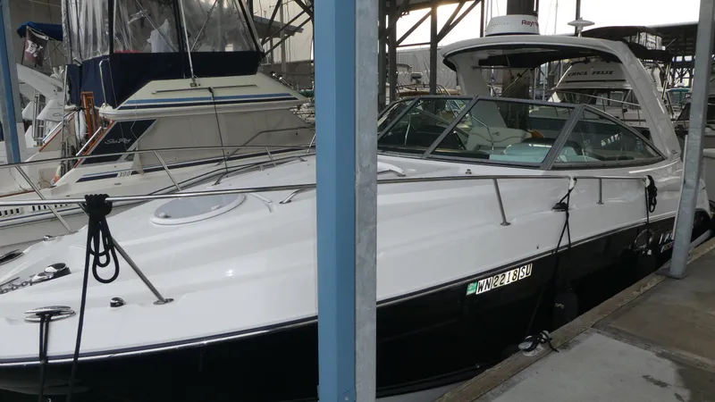 Slide: The Image of 2019 Monterey 295 Sport Yacht docked in marina. - 1