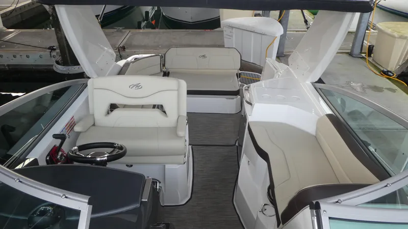 Slide: The Image of Interior of 2019 Monterey 295 Sport Yacht with luxurious seating. - 13