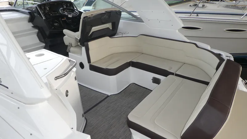 Slide: The Image of Interior of 2019 Monterey 295 Sport Yacht with sleek seating arrangement. - 14