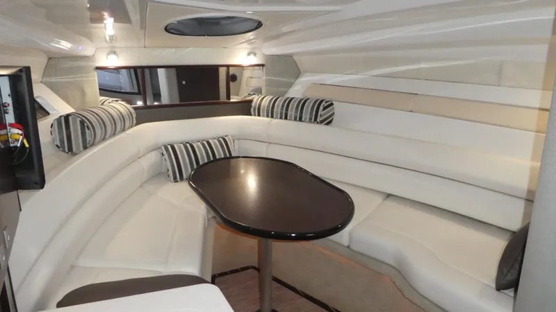 Slide: The Image of Interior of 2019 Monterey 295 Sport Yacht with elegant seating area. - 25