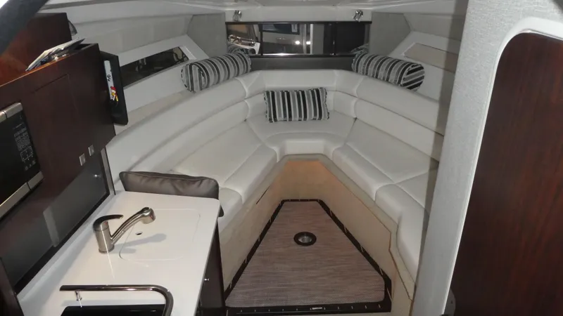 Slide: The Image of Interior of 2019 Monterey 295 Sport Yacht with elegant seating area. - 26