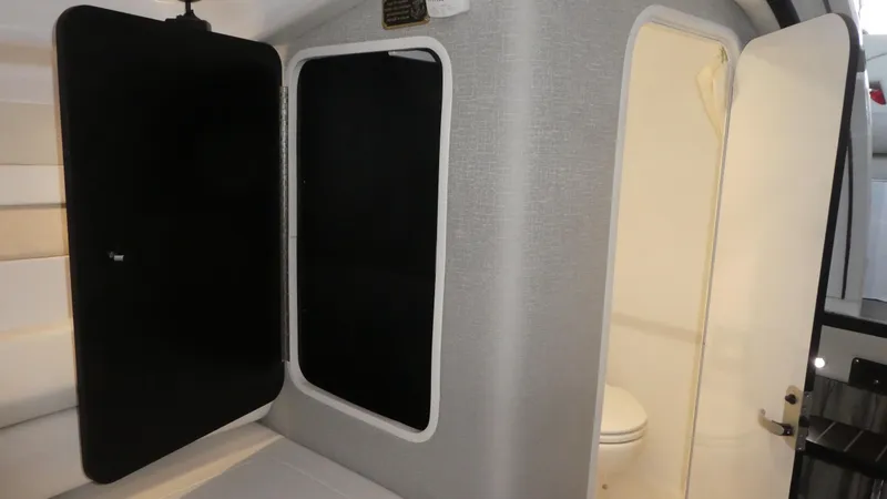 Slide: The Image of Interior of 2019 Monterey 295 Sport Yacht with toilet. - 35