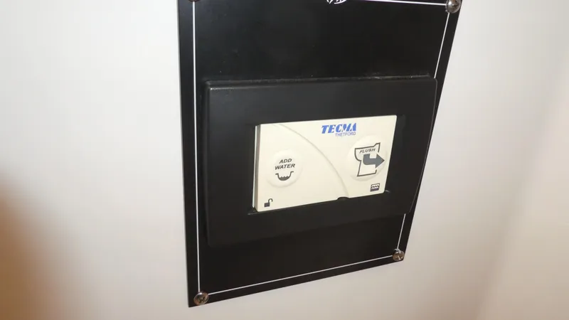 Slide: The Image of Tecma marine toilet control panel on 2019 Monterey 295 Sport Yacht. - 37