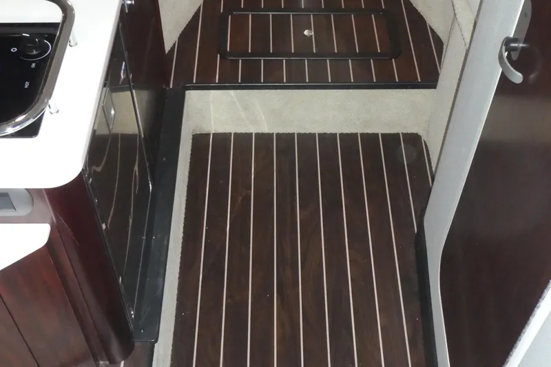 Slide: The Image of Interior of 2019 Monterey 295 Sport Yacht with wooden flooring. - 41