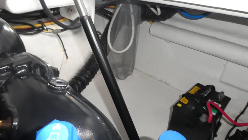 Slide: The Image of Interior of a 2019 Monterey 295 Sport Yacht with battery and cables. - 46