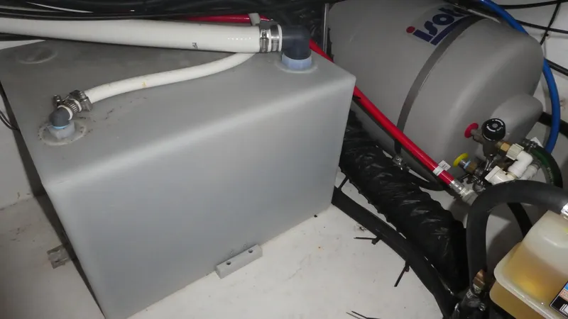 Slide: The Image of Water tank and hoses in 2019 Monterey 295 Sport Yacht. - 47