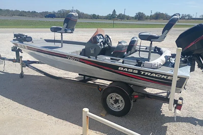 Slide: The Image of 2007 Tracker Pro Team 175 bass boat on trailer, parked outdoors. - 3
