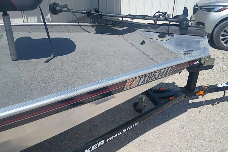 Slide: The Image of 2007 Tracker Pro Team 175 boat on trailer, featuring a sleek aluminum design. - 7