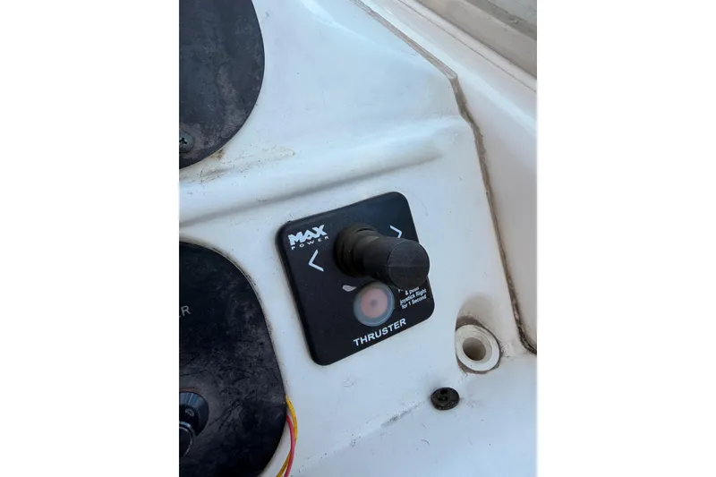 Slide: The Image of Control panel of a 1996 Sea Ray 450 Sundancer boat thruster system. - 19