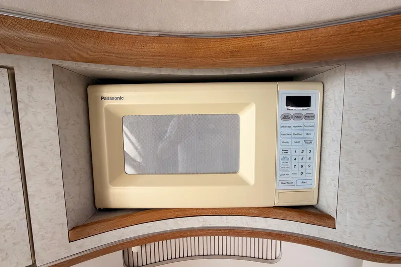 Slide: The Image of Panasonic microwave in 1996 Sea Ray 450 Sundancer yacht kitchen. - 31