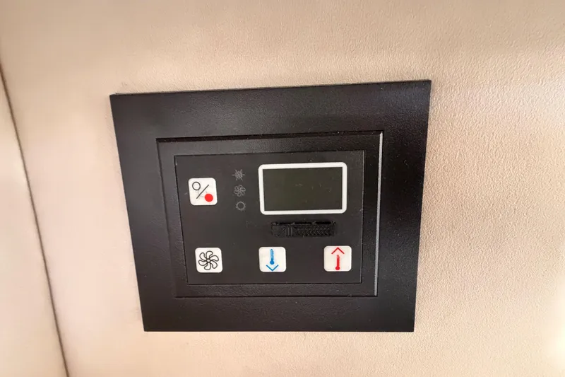 Slide: The Image of Control panel on a 1996 Sea Ray 450 Sundancer yacht interior. - 50