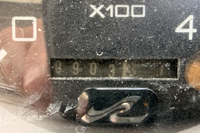 Slide: The Image of Close-up of a dusty gauge on a 1996 Sea Ray 450 Sundancer boat. - 57