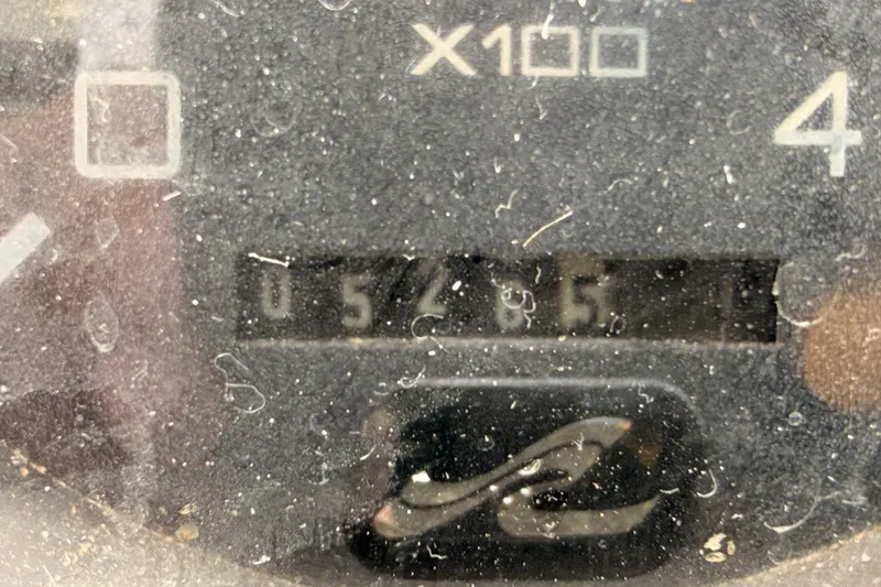 Slide: The Image of Close-up of a dusty gauge on a 1996 Sea Ray 450 Sundancer boat. - 58