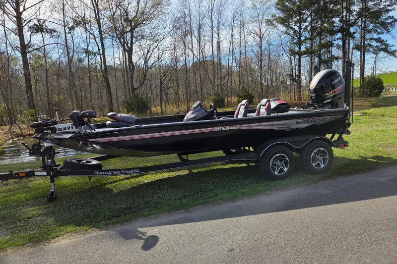 The Image of 2026 Ranger RT198P boat parked on trailer outdoors. - 0