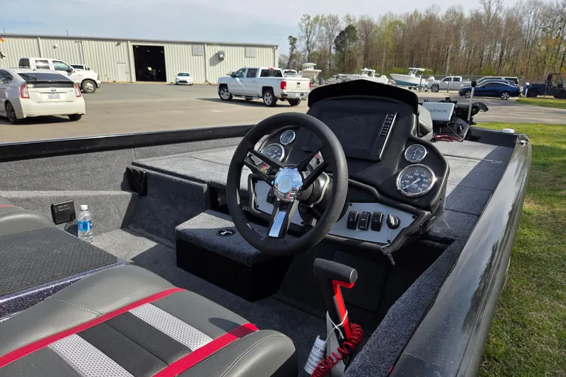 Slide: The Image of Interior view of 2026 Ranger RT198P with steering console. - 11